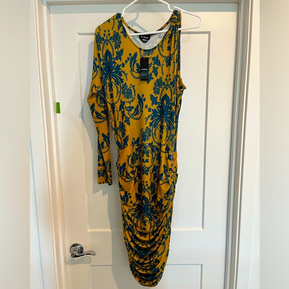 Brand new Bebe size medium dress
